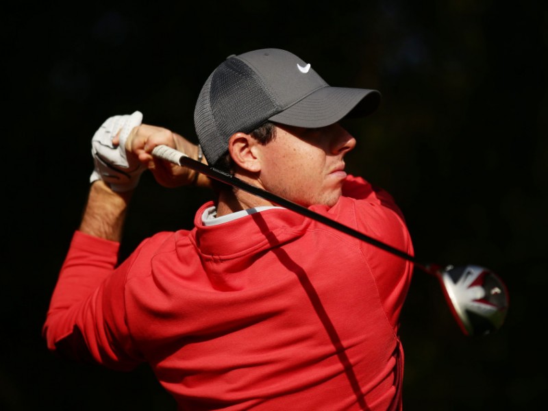 从天才到王者麦克罗伊的挥杆背影与赛场瞬间