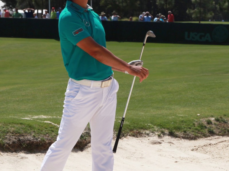 从沙坑救球到传承推杆梁文冲的高尔夫人生路